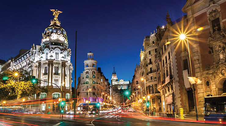 Street lights and streaking car lights in centre Madrid