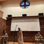 someone singing on stage