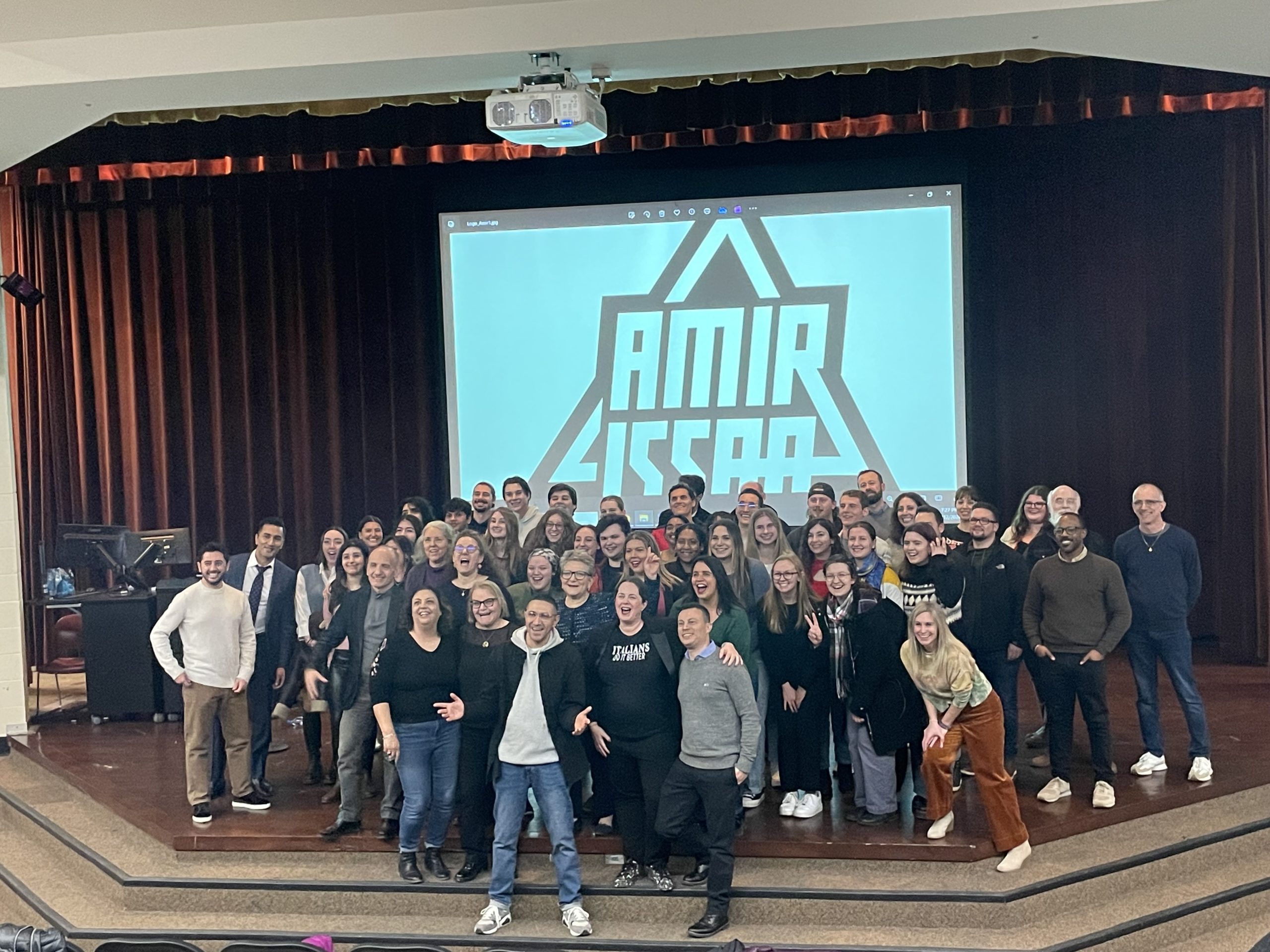 Read more about the article Italian Program Students Attend Concert by Amir Issaa